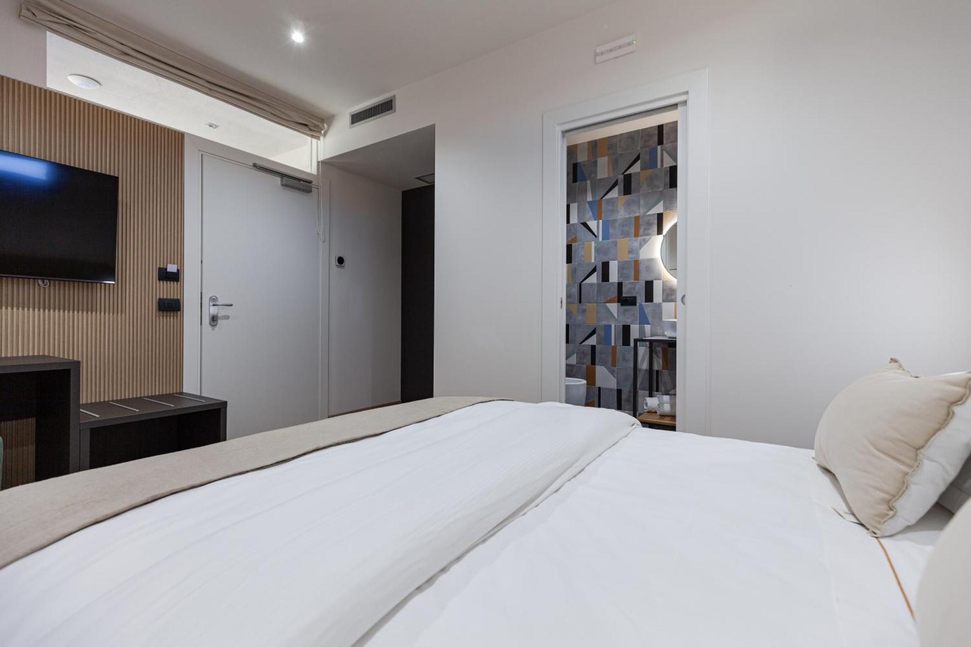 Rh Lifestyle Rooms & Suites 奧爾比亞 外观 照片