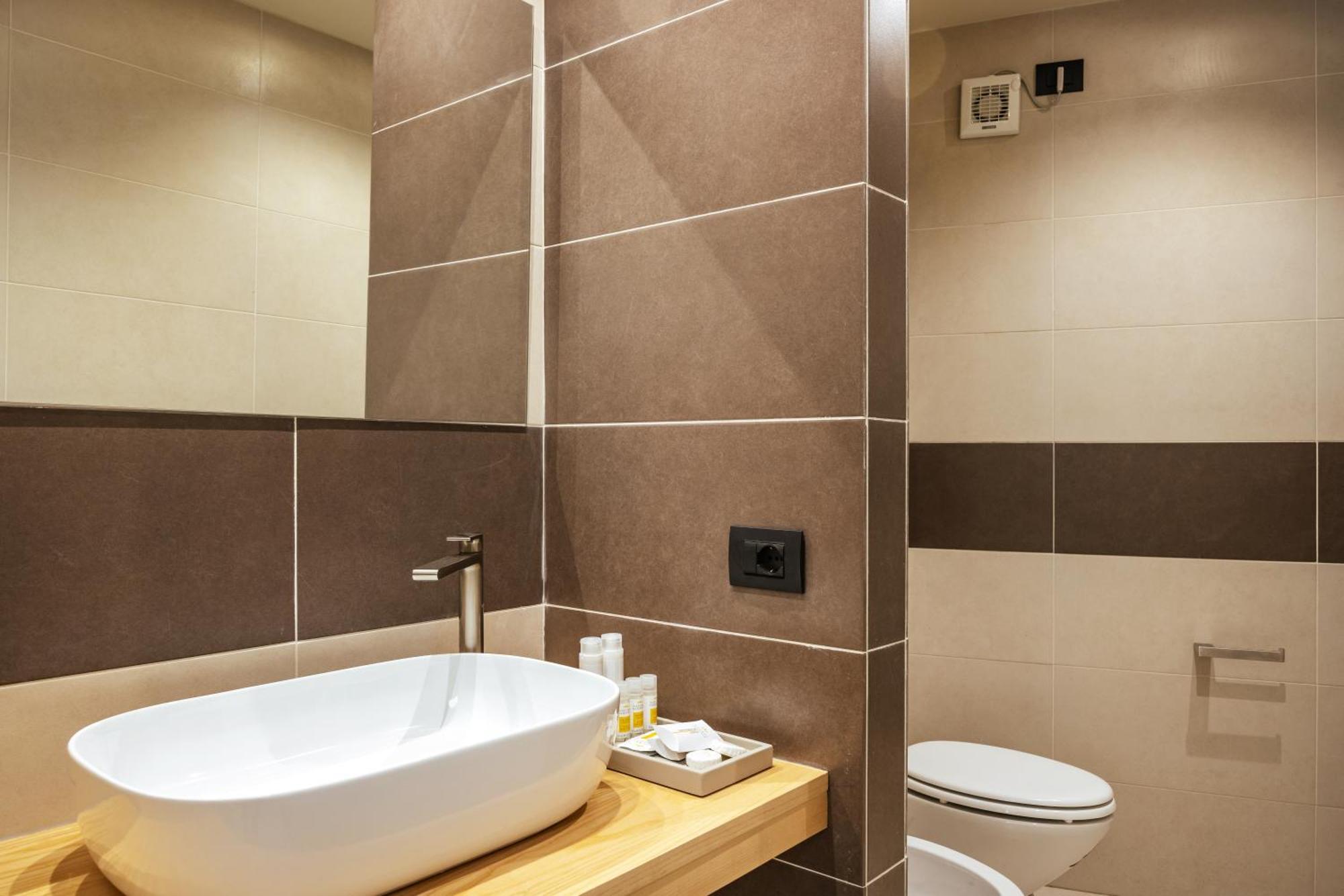 Rh Lifestyle Rooms & Suites 奧爾比亞 客房 照片